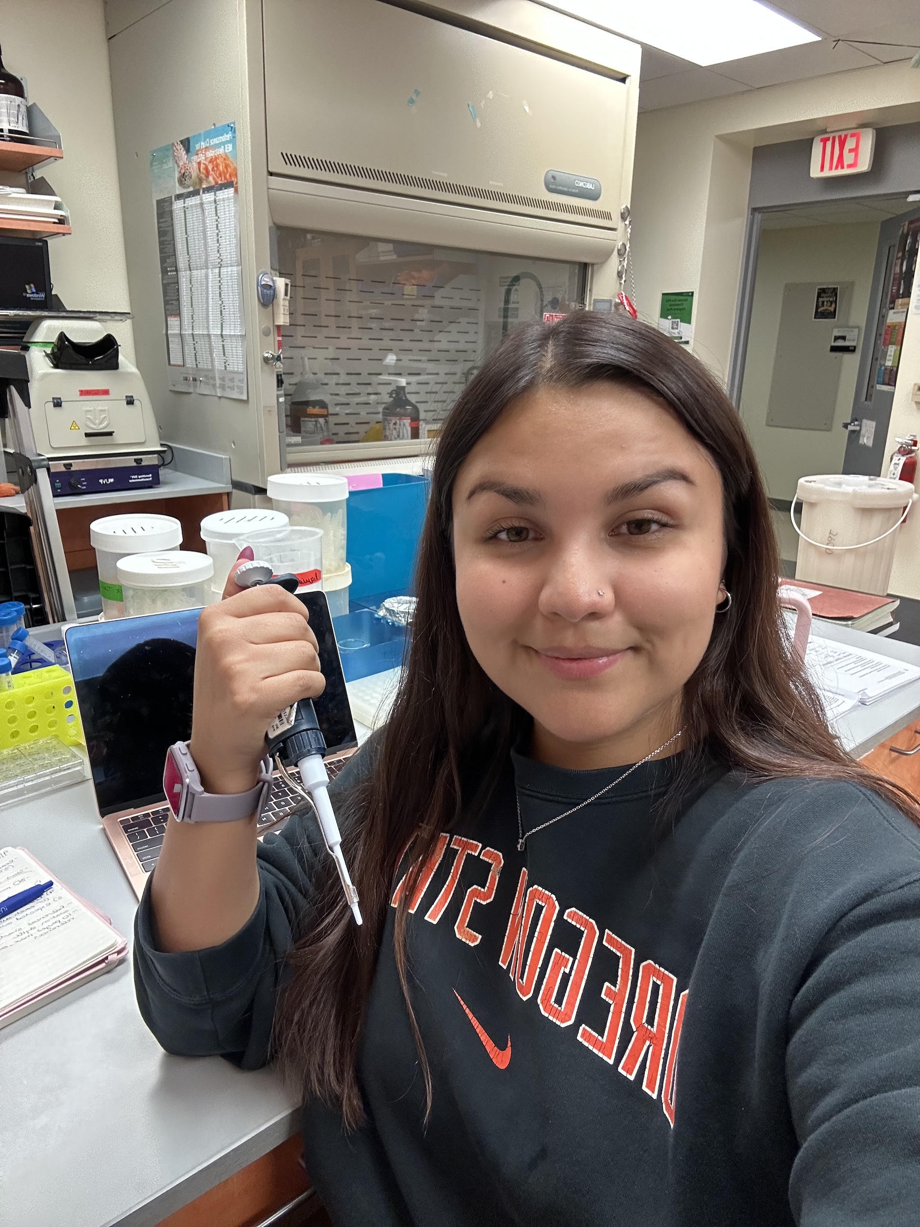 Rosy holding a micropipette